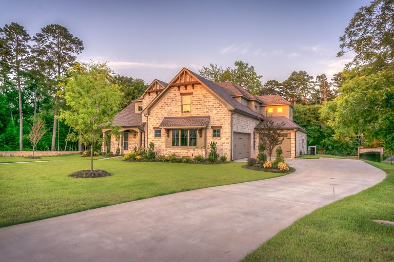 Estate property with manicured grounds
